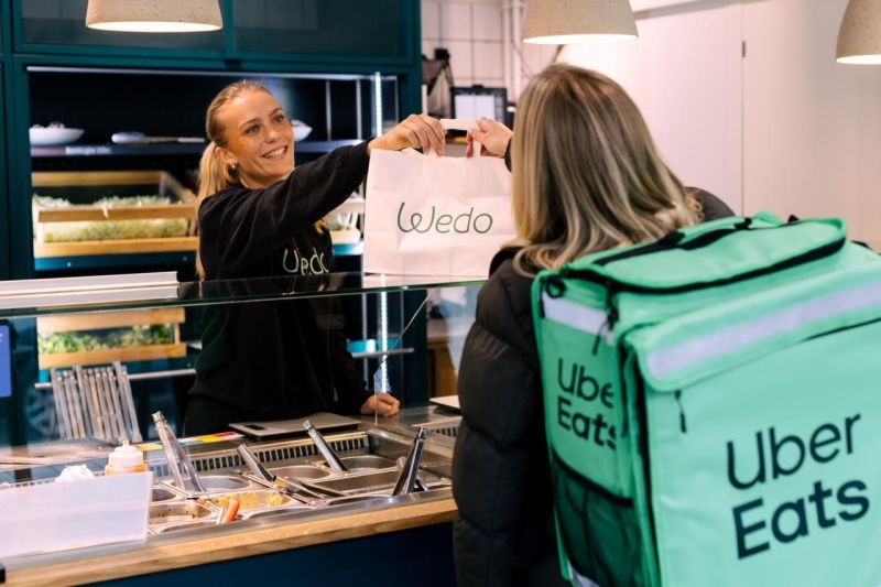 Just Eat Exits Denmark as Uber Eats Launches in Co